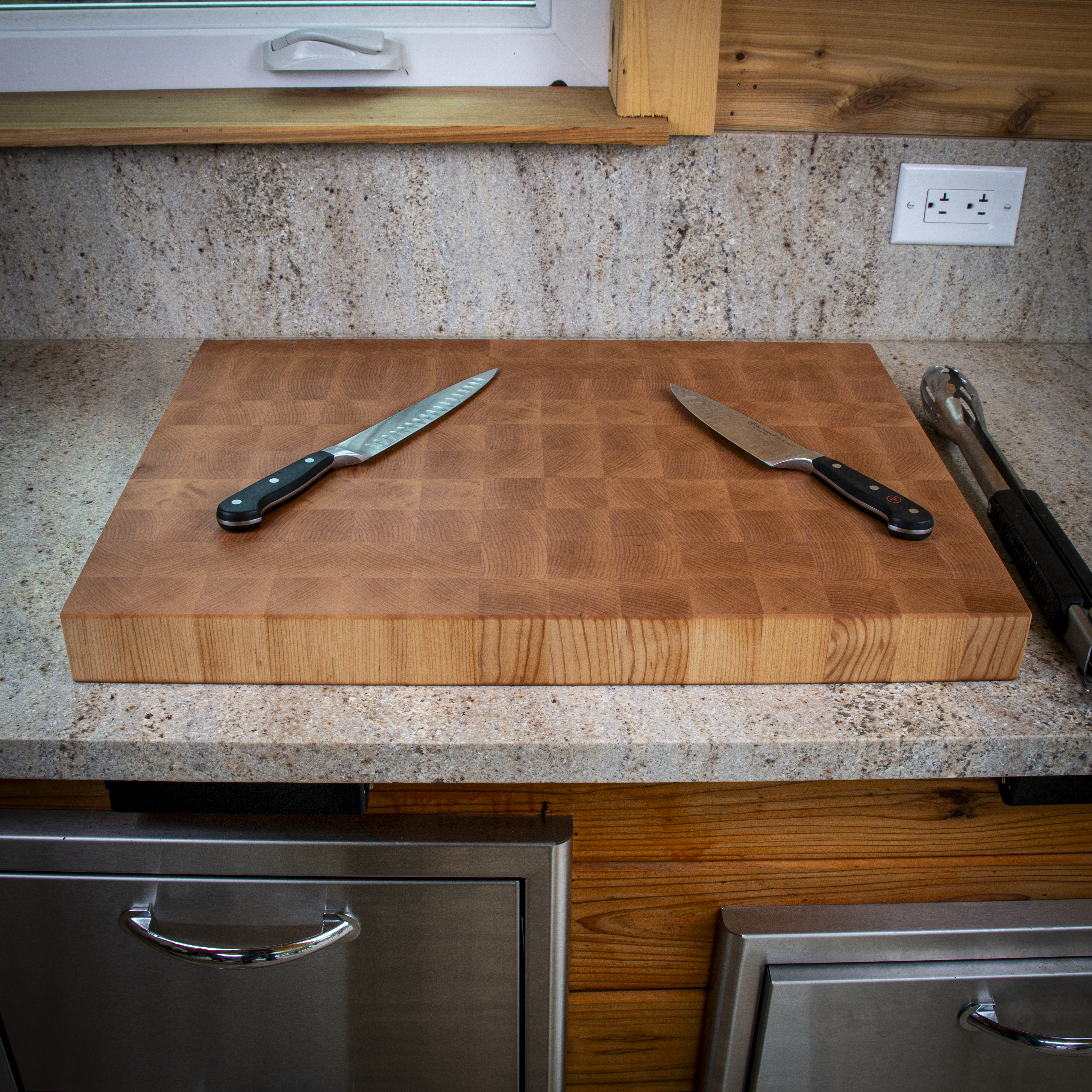 Large end grain maple cutting board for heavy prep and serving