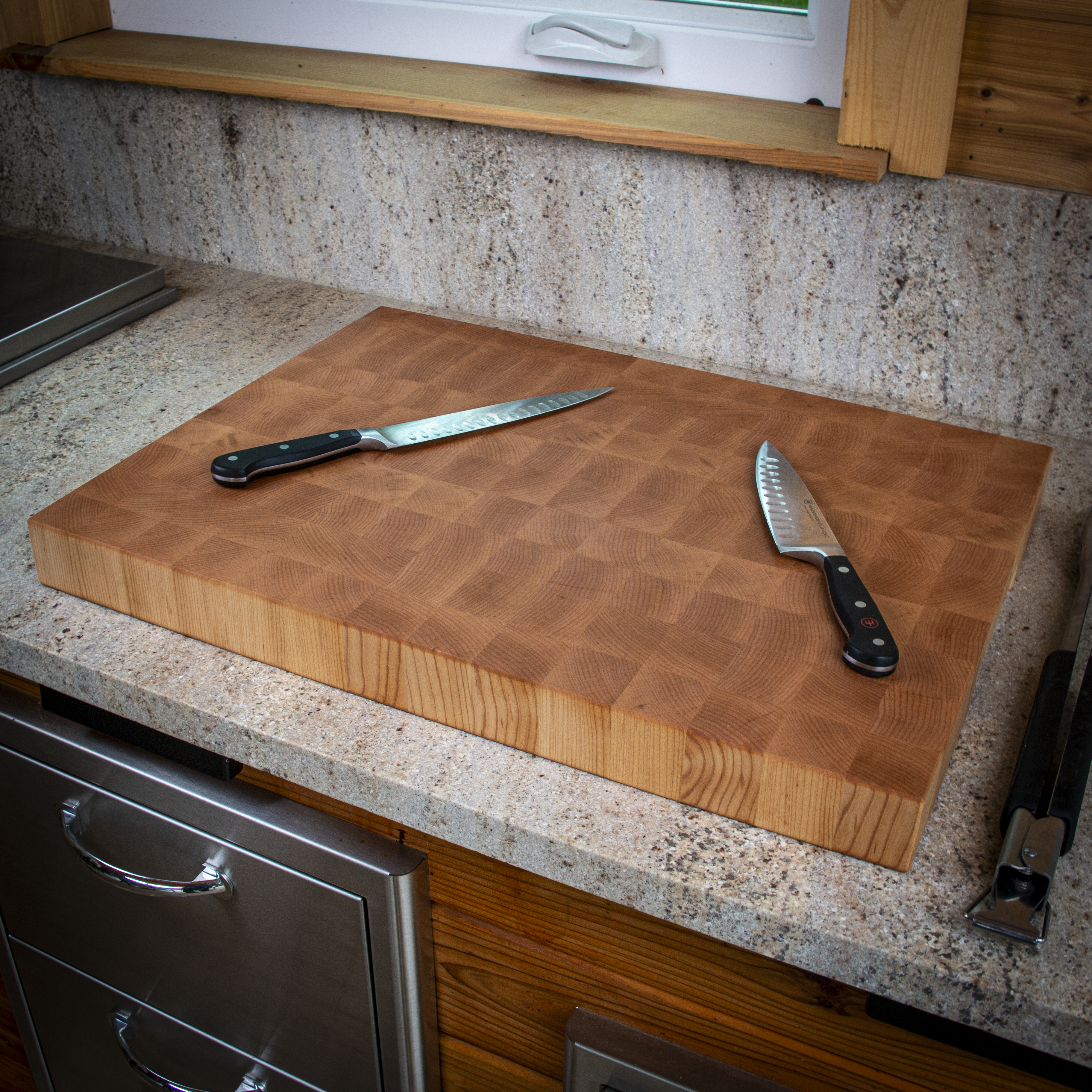 Large end grain maple cutting board for heavy prep and serving