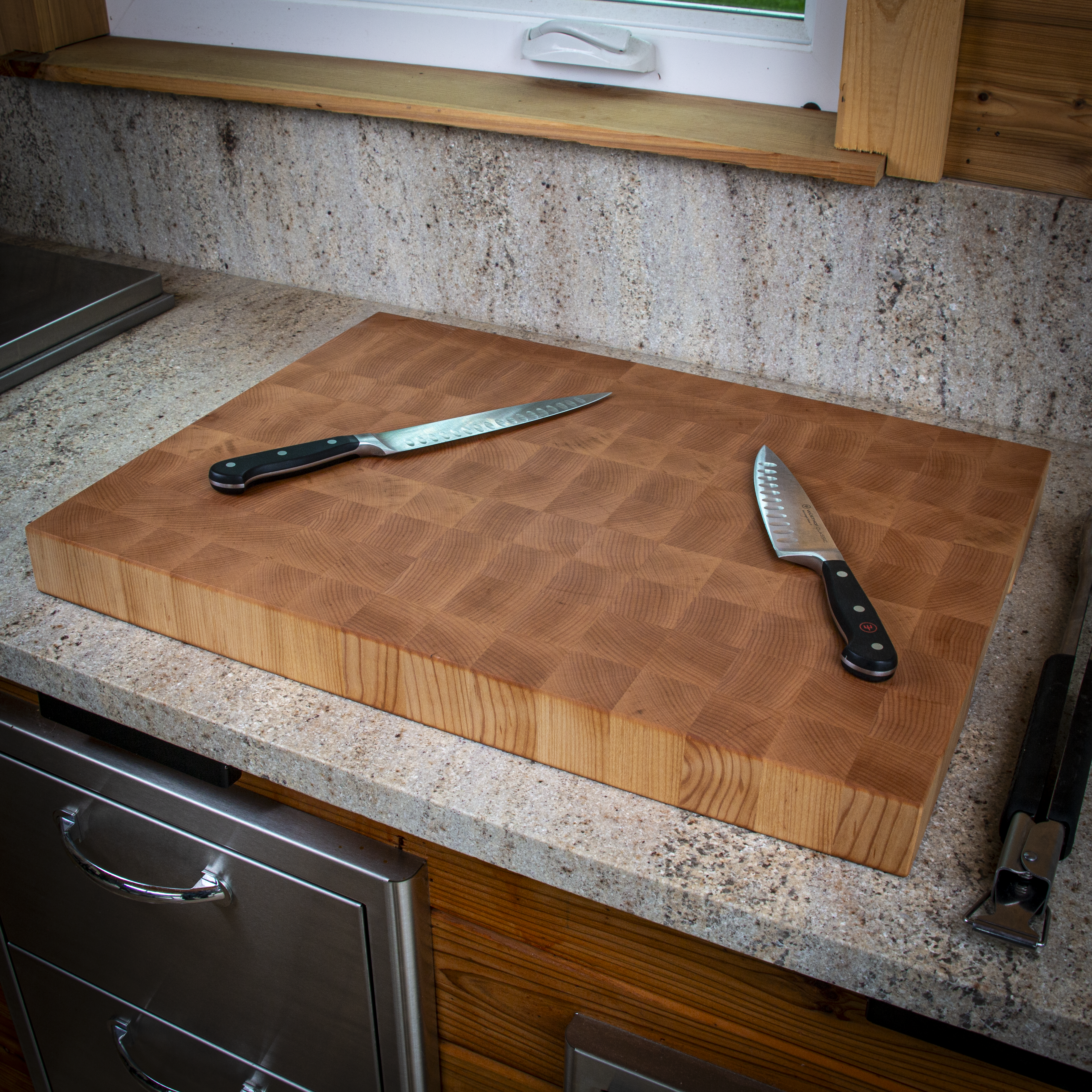 Large end grain maple cutting board for heavy prep and serving