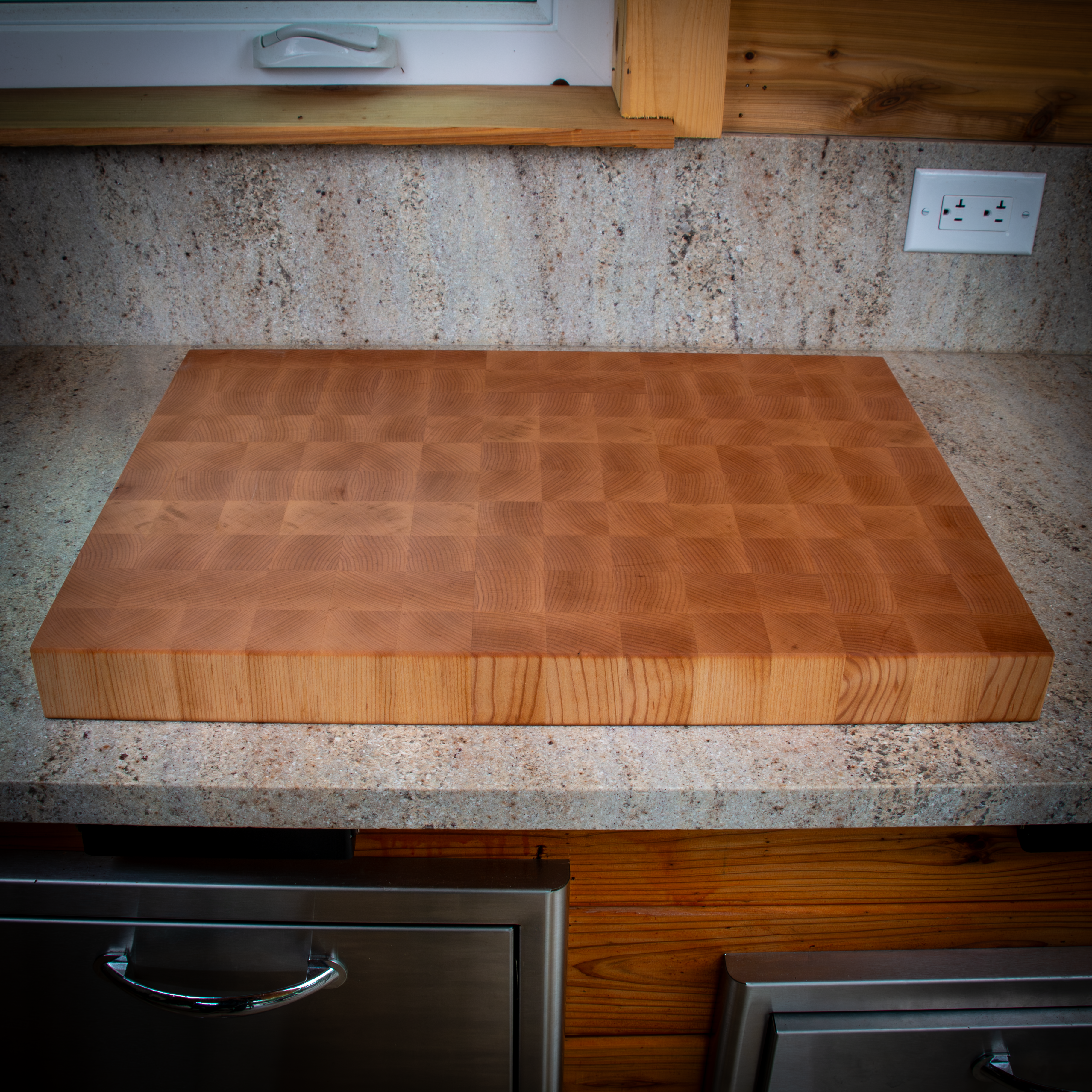 Large end grain maple cutting board for heavy prep and serving