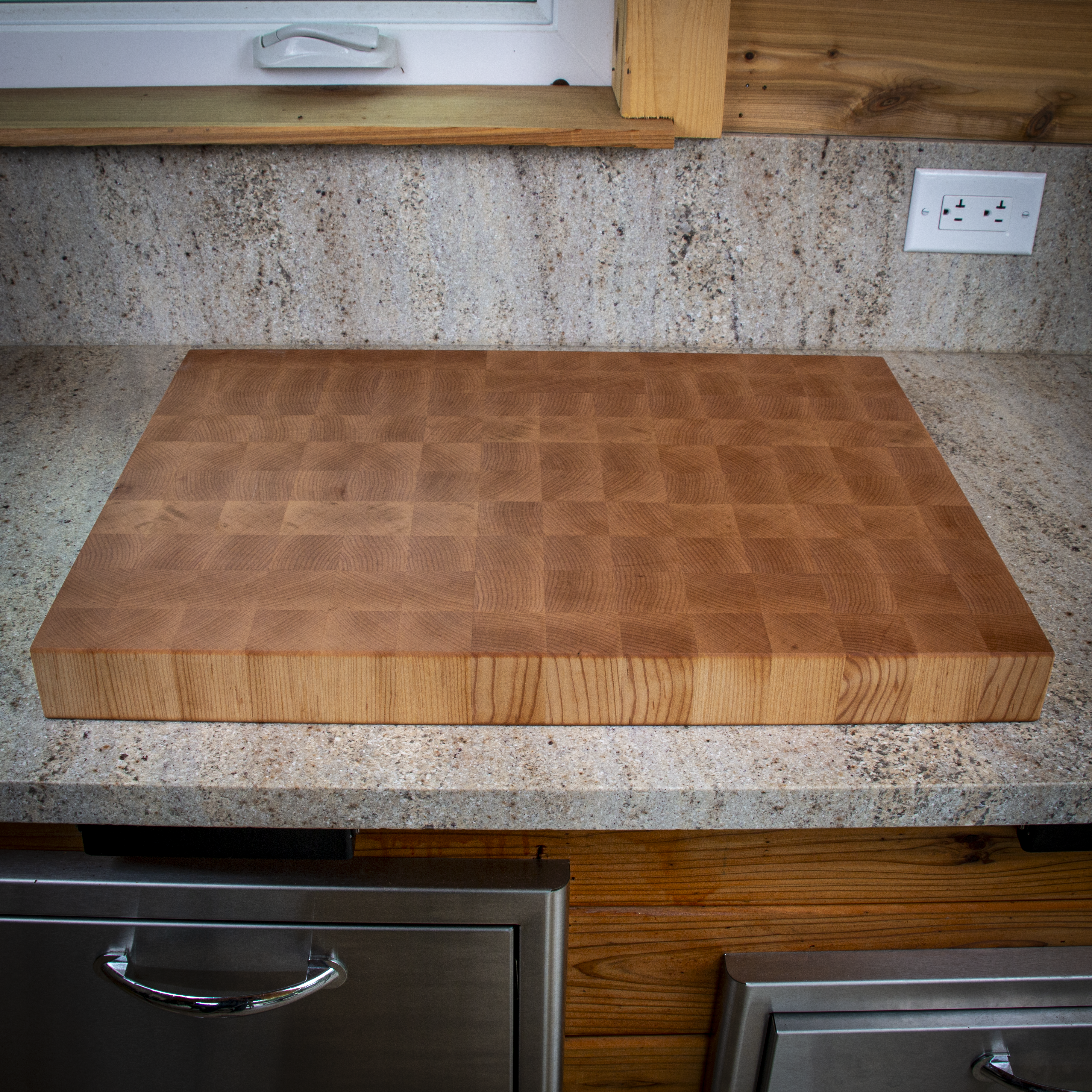 Large end grain maple cutting board for heavy prep and serving