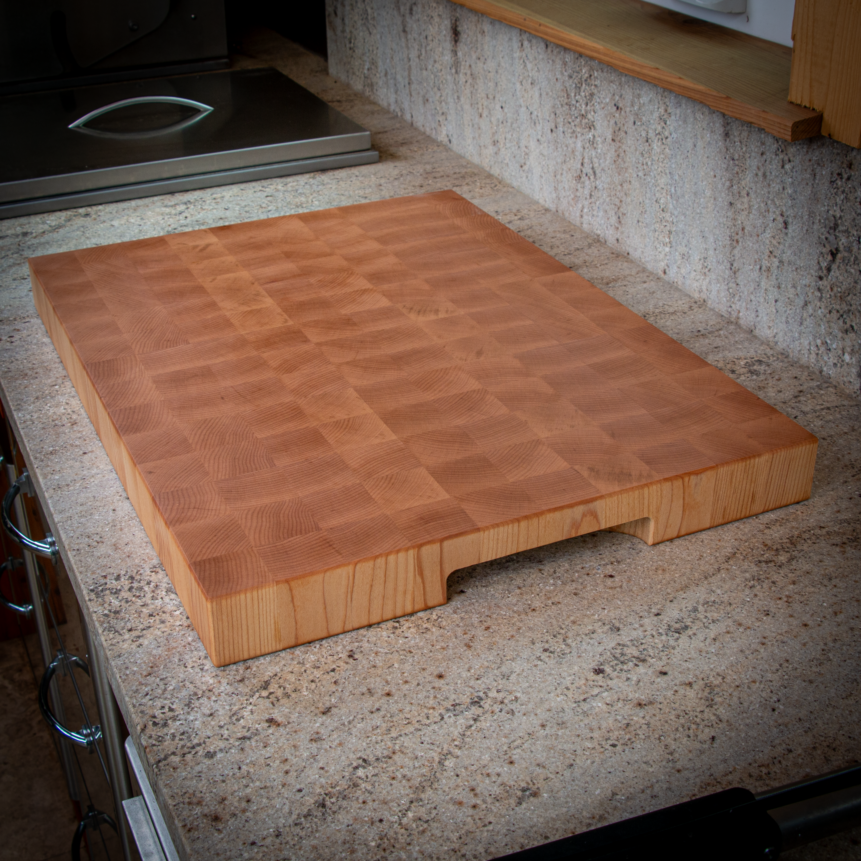 Large end grain maple cutting board for heavy prep and serving