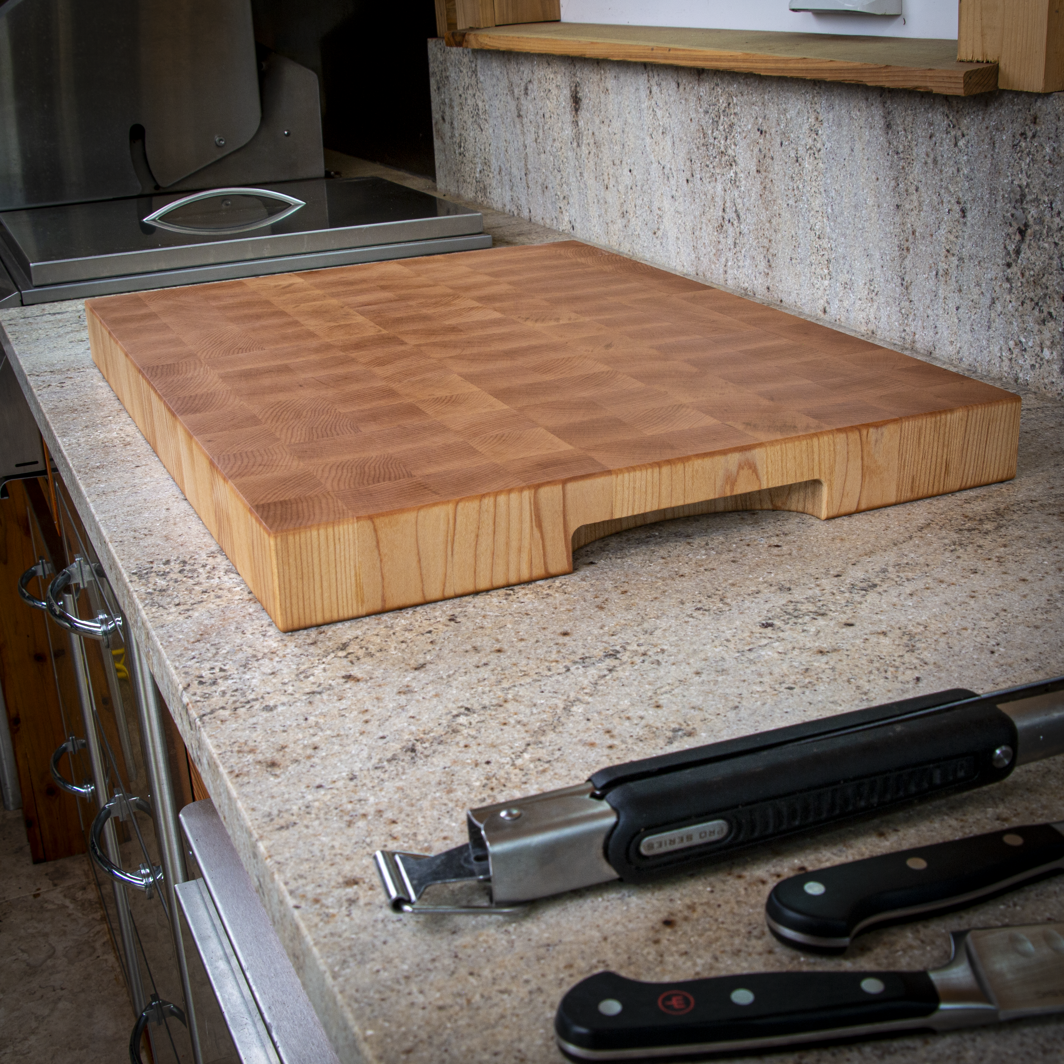 Large end grain maple cutting board for heavy prep and serving