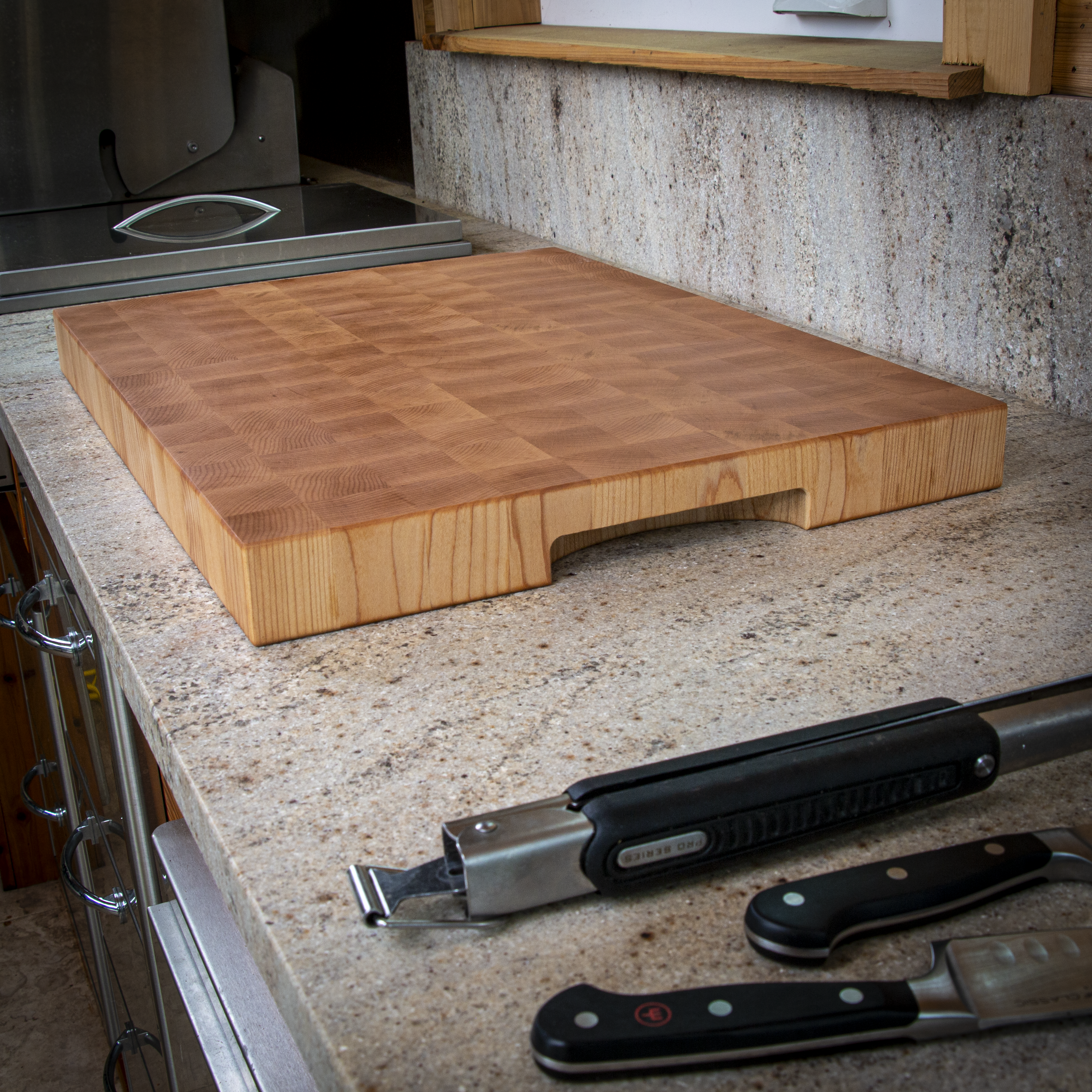 Large end grain maple cutting board for heavy prep and serving
