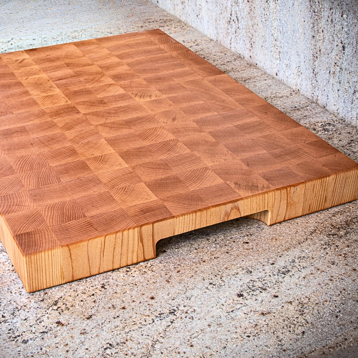 Large end grain maple cutting board for heavy prep and serving