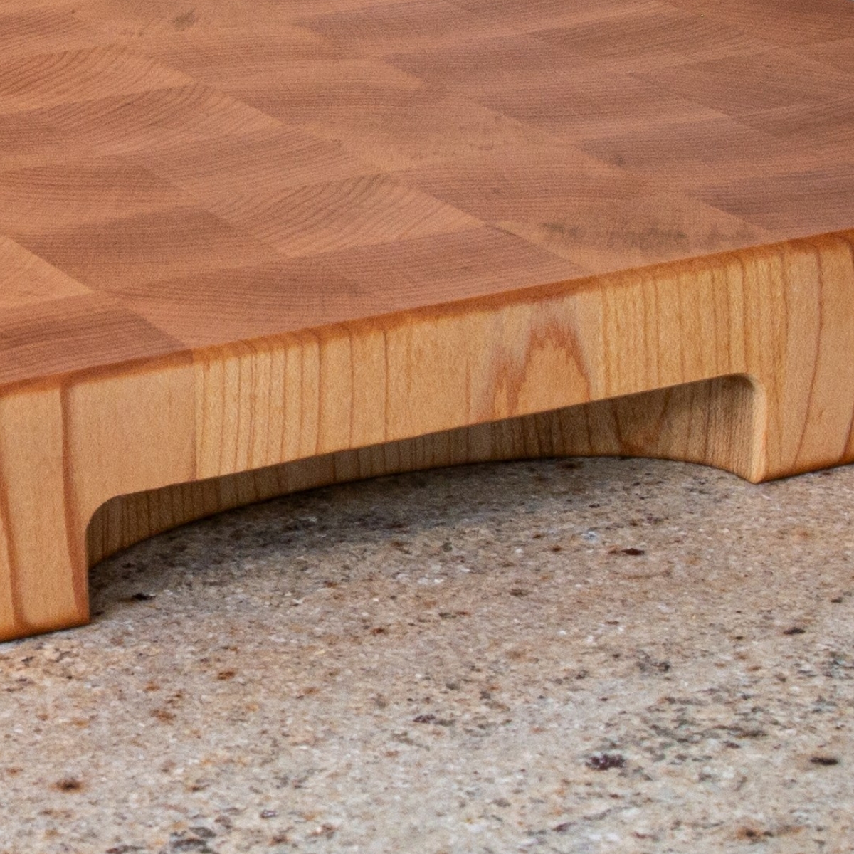 Large end grain maple cutting board for heavy prep and serving