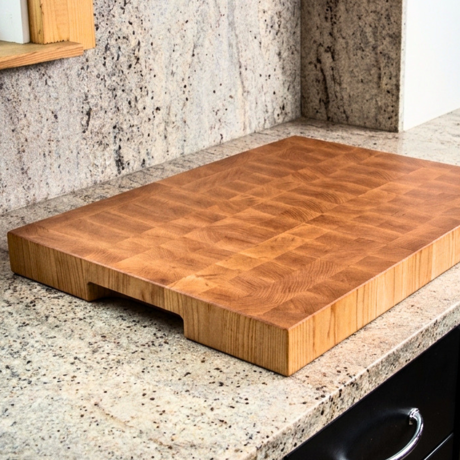 Large end grain maple cutting board for heavy prep and serving