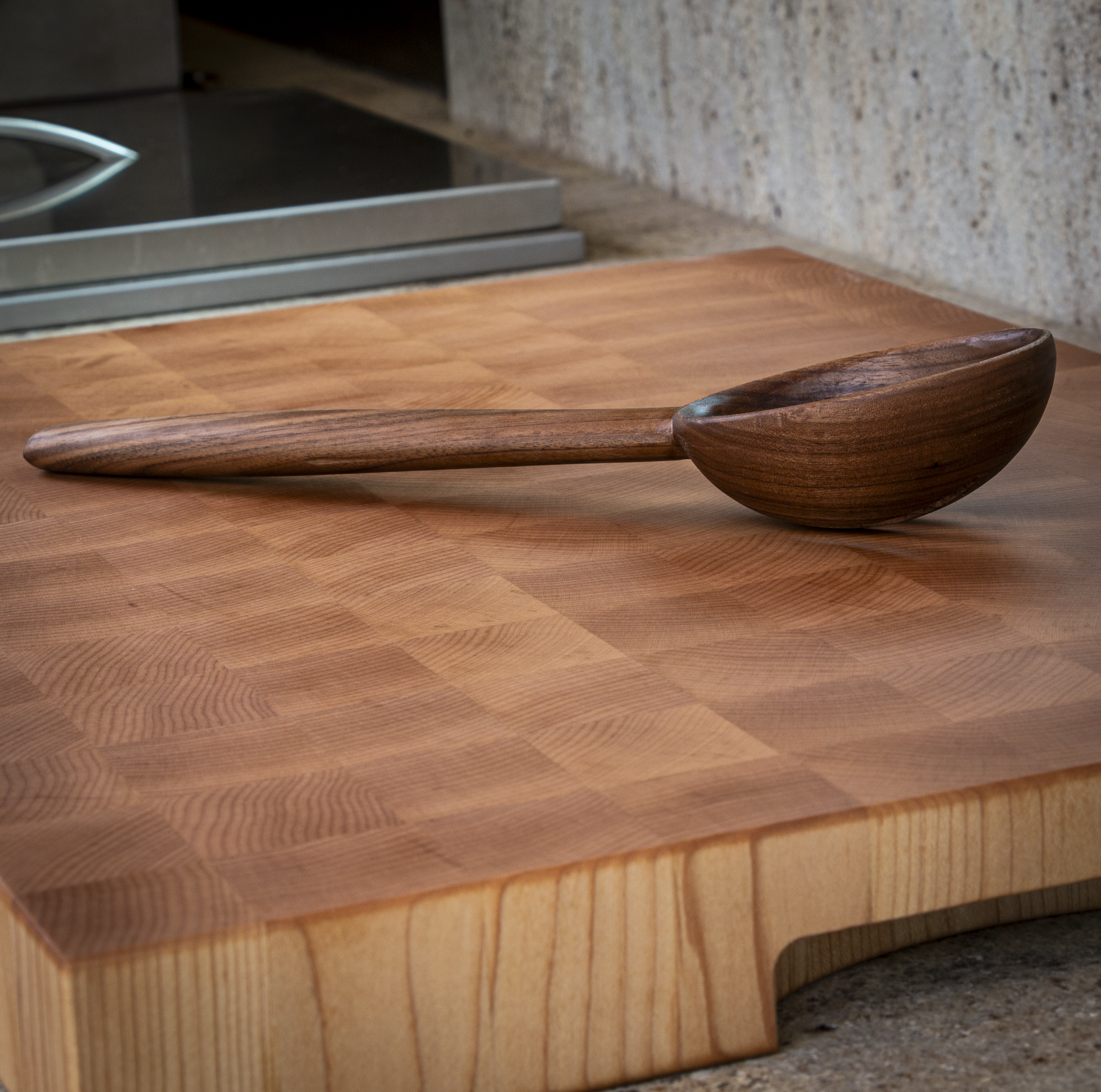 Large slotted wooden cooking spoon for draining and stirring