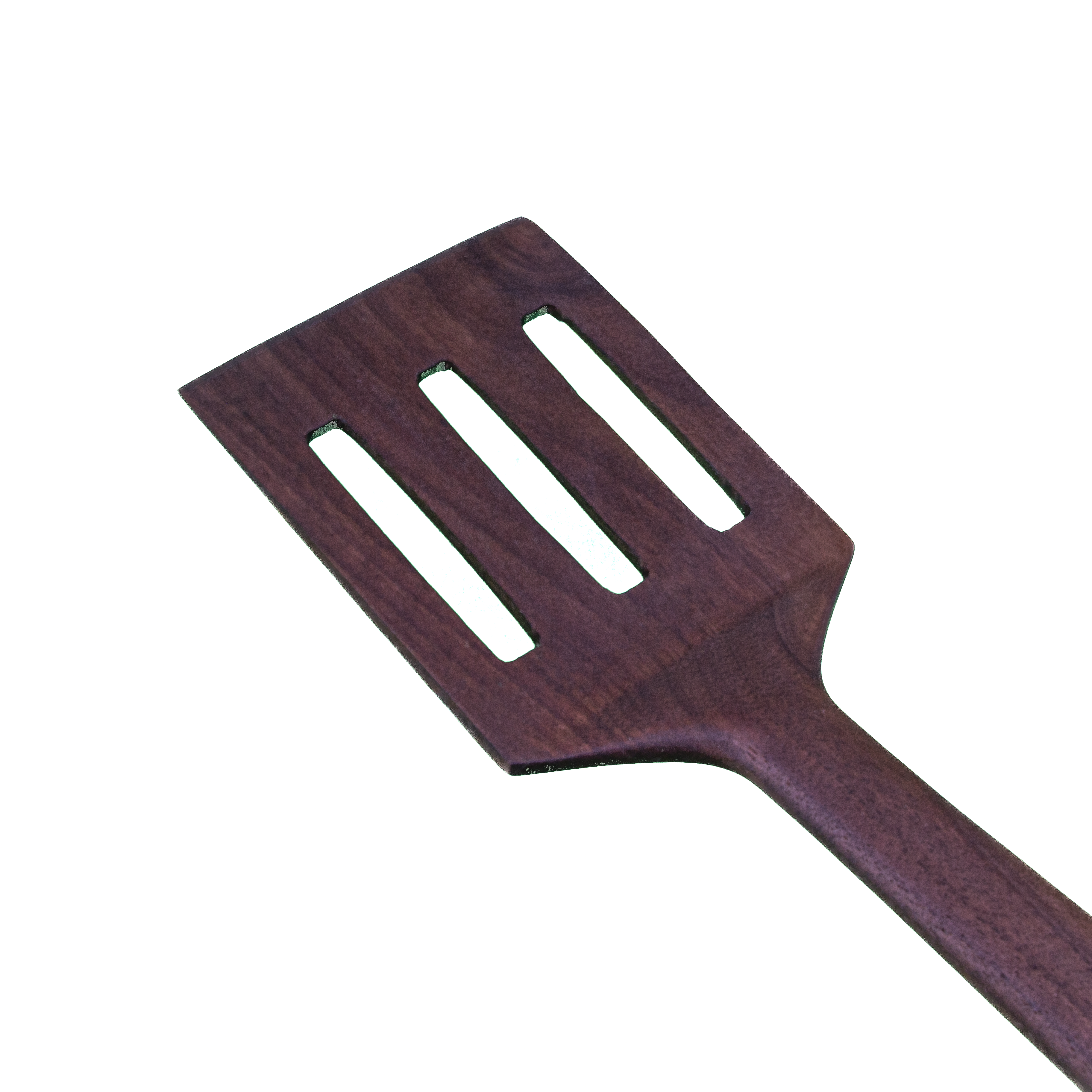 Slotted wood turner spatula for flipping and draining in the kitchen