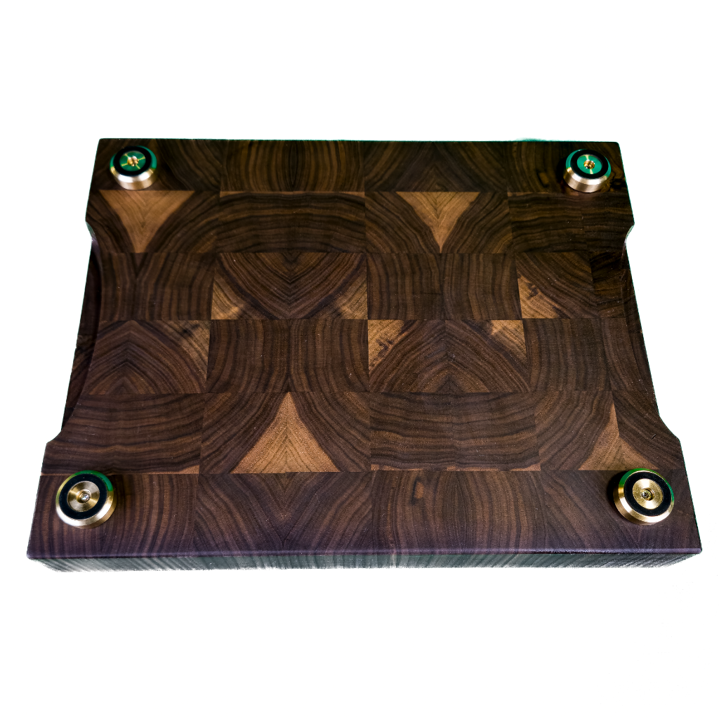 End grain walnut cutting board on countertop for prep and serving