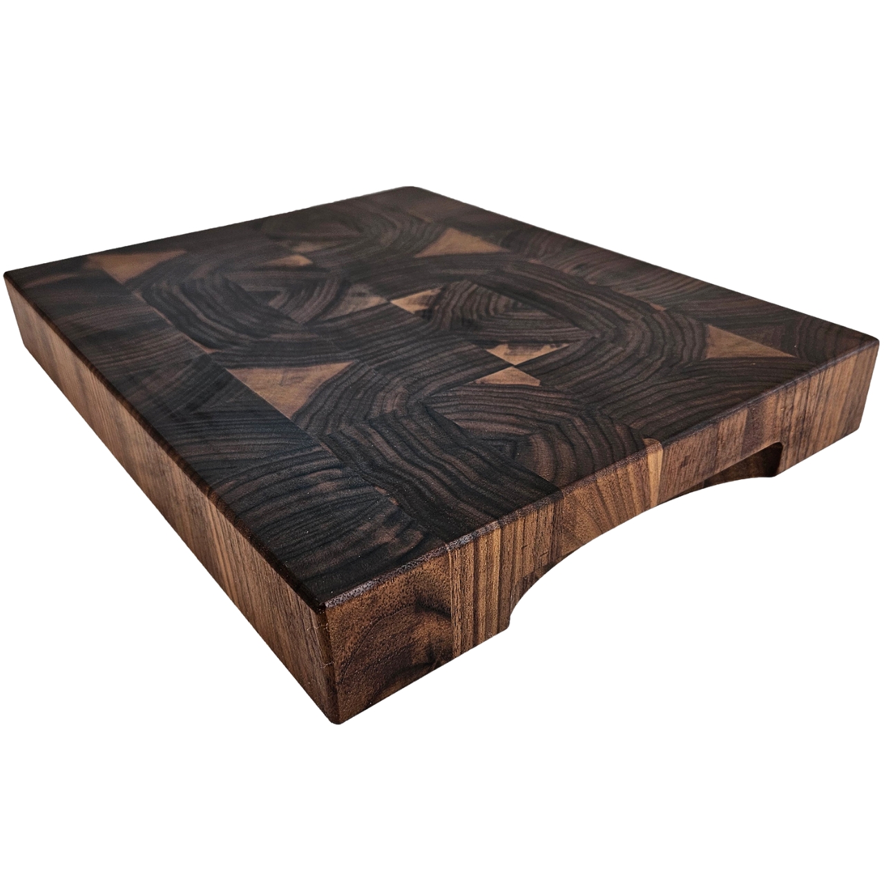 End grain walnut cutting board on countertop for prep and serving