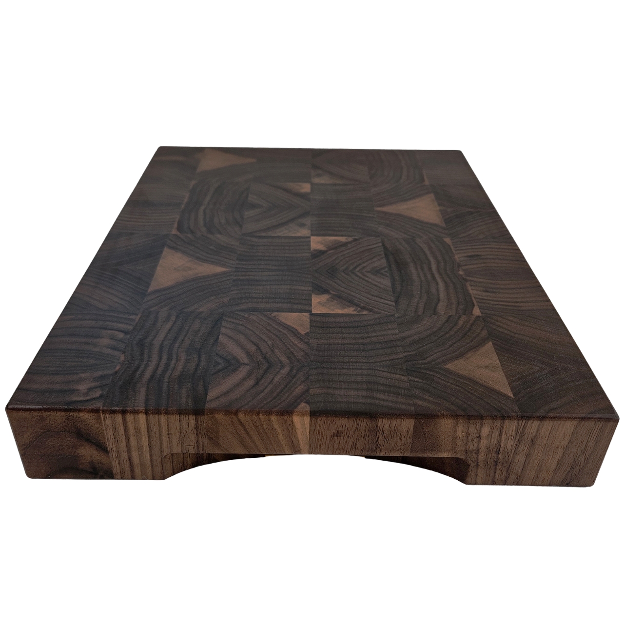 End grain walnut cutting board on countertop for prep and serving